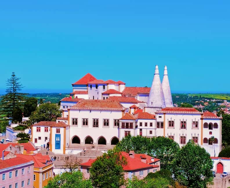 From Lisbon: Pena Palace, Regaleira, Monserrate & Cabo Roca - Guincho Beach pass-by and Cascais wind-down