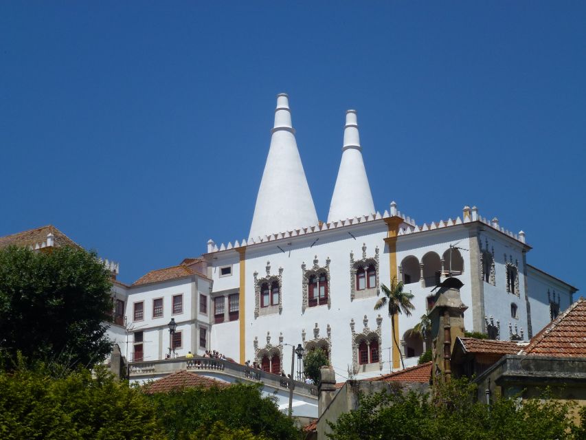From Lisbon: Sintra Pena Palace Cascais 8-People Group Tour - Cabo da Roca: western edge of Europe, with wind included