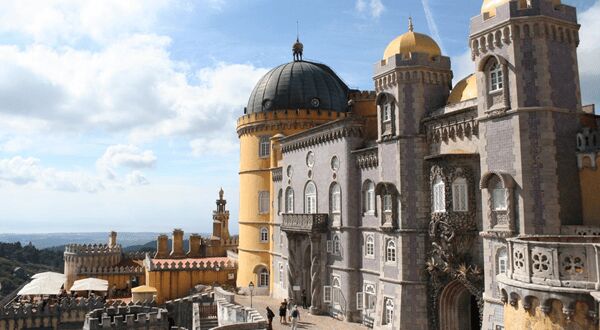 From Lisbon: Sintra Pena Regaleira Roca Cap Cascais Tour - Quinta da Regaleira: Romantic Palace Energy and Garden Time