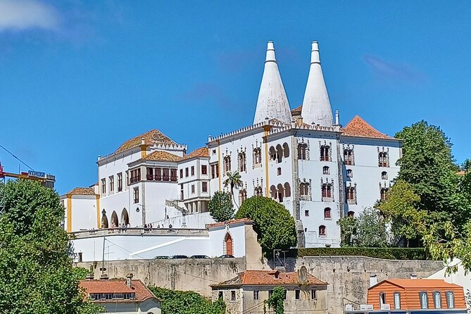 Group to Pena Palace, Sintra (pass by Regaleira) and Cascais - Sintra’s historic village stop: easy walking and the right kind of background