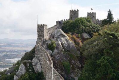 Guided Tour to Sintra and Cascais - Park and National Palace of Pena: bright architecture and UNESCO views