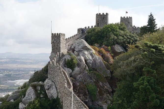 Guided Tour to Sintra and Cascais - Park and National Palace of Pena: bright architecture and UNESCO views