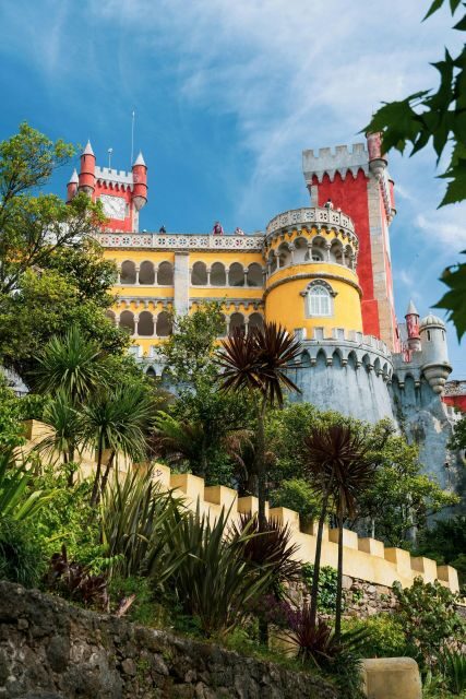 Lisbon: Sintra, Pena Palace, Cabo da Roca & Cascais Day Tour - Sintra town time, photo stops, and a dessert moment