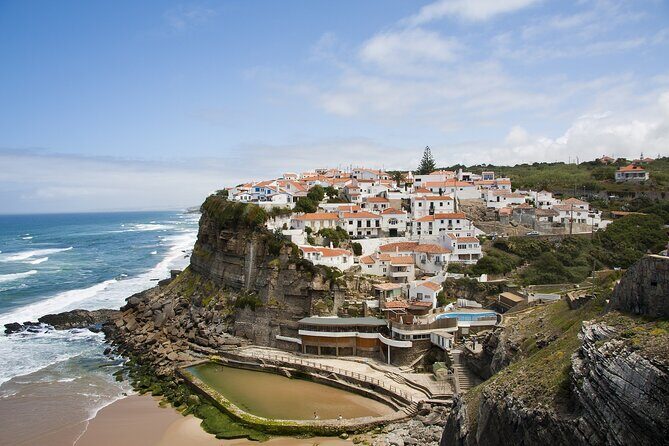 Private Tour Sintra, Pena Palace and Cascais from Lisbon - Quinta da Regaleira: the Initiation Well and underground drama
