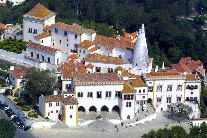 Sintra and Cascais Half Day Trip from Lisbon in Private Vehicle - Quinta da Regaleira: grottos, statues, and your ticket time