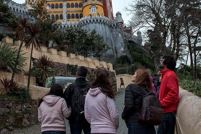 Sintra & Cascais Day Tour with Pena Palace Entry and Gardens Walk - The minivan experience: WiFi, live commentary, and guide quality