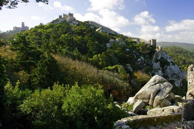 Sintra & Cascais Day Tour with Pena Palace Entry and Gardens Walk - What to wear and bring for Pena’s hills and Cabo’s wind