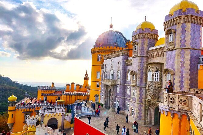 Sintra Half Day with Pena Palace and Regaleira from Lisbon - Quinta da Regaleira: gardens, the Initiation Well, and symbolism