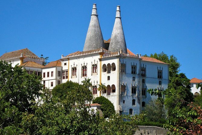 Sintra, Pena Palace, Quinta da Regaleira & Cascais Group Tour - Estoril drive-by: the casino gardens moment