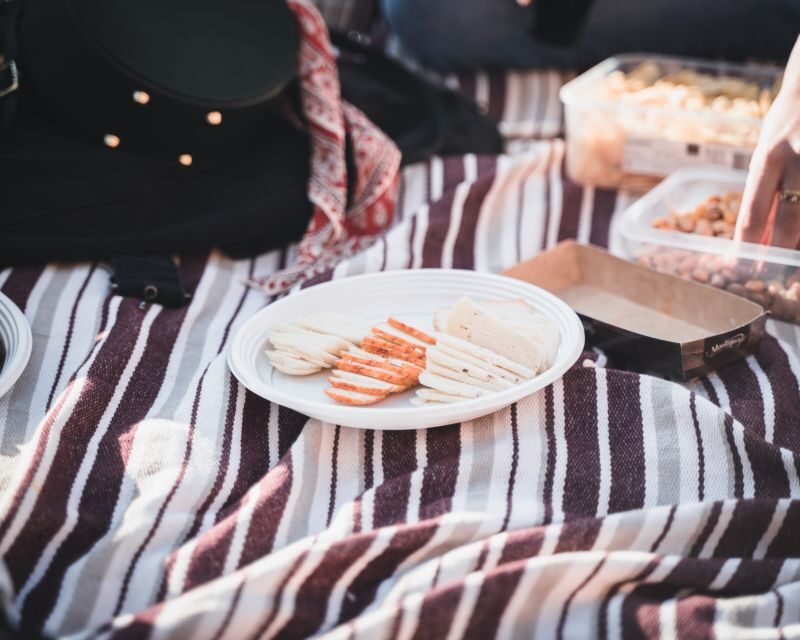 Sintra: Sunset Hike, Tapas & Wine at Secret Beach - What’s included beyond food: Polaroid, sound system, and practical comfort